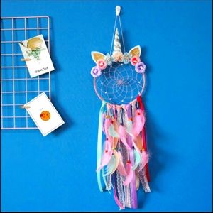 Unicorn pink feathers with flowers dreamcatcher.